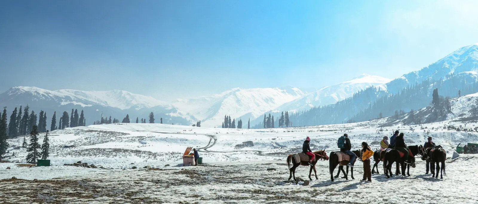 5 Nights 6 Days Kashmir winter tour package starting at ₹18,500 per person available from October onwards featuring snow-covered Gulmarg gondola, Pahalgam, and Dal Lake houseboat stay